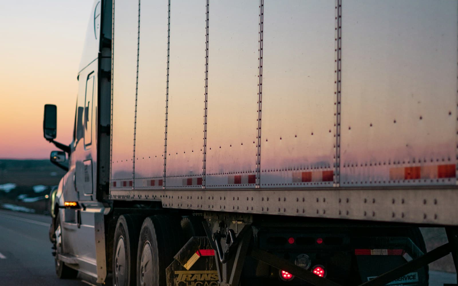 A commercial lorry travelling on the road
